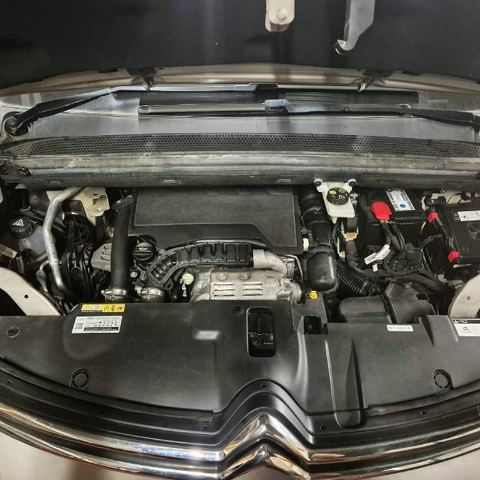 Citroen with bonnet up showing puretech engine Citroen with bonnet up showing puretech engine